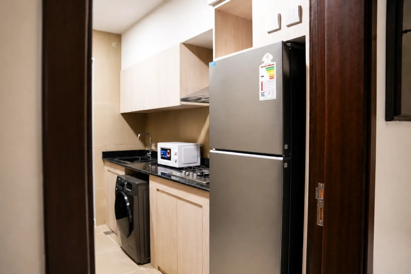 apartment kitchenette and laundry facilities